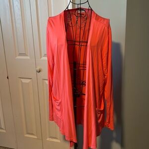 Coral cardigan with pockets.